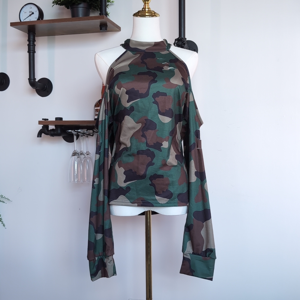 Edgy Cold-Shoulder Camo Halter Top in Green. Perfect for Model Off-Duty Look